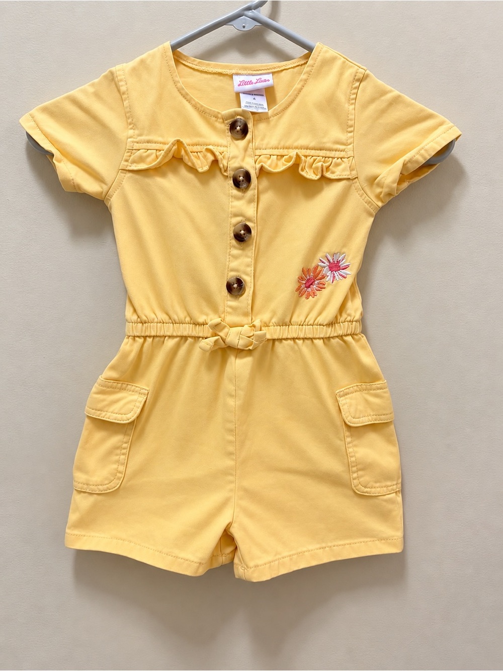 Little Lass Yellow Short-Sleeve Romper with Floral Accent